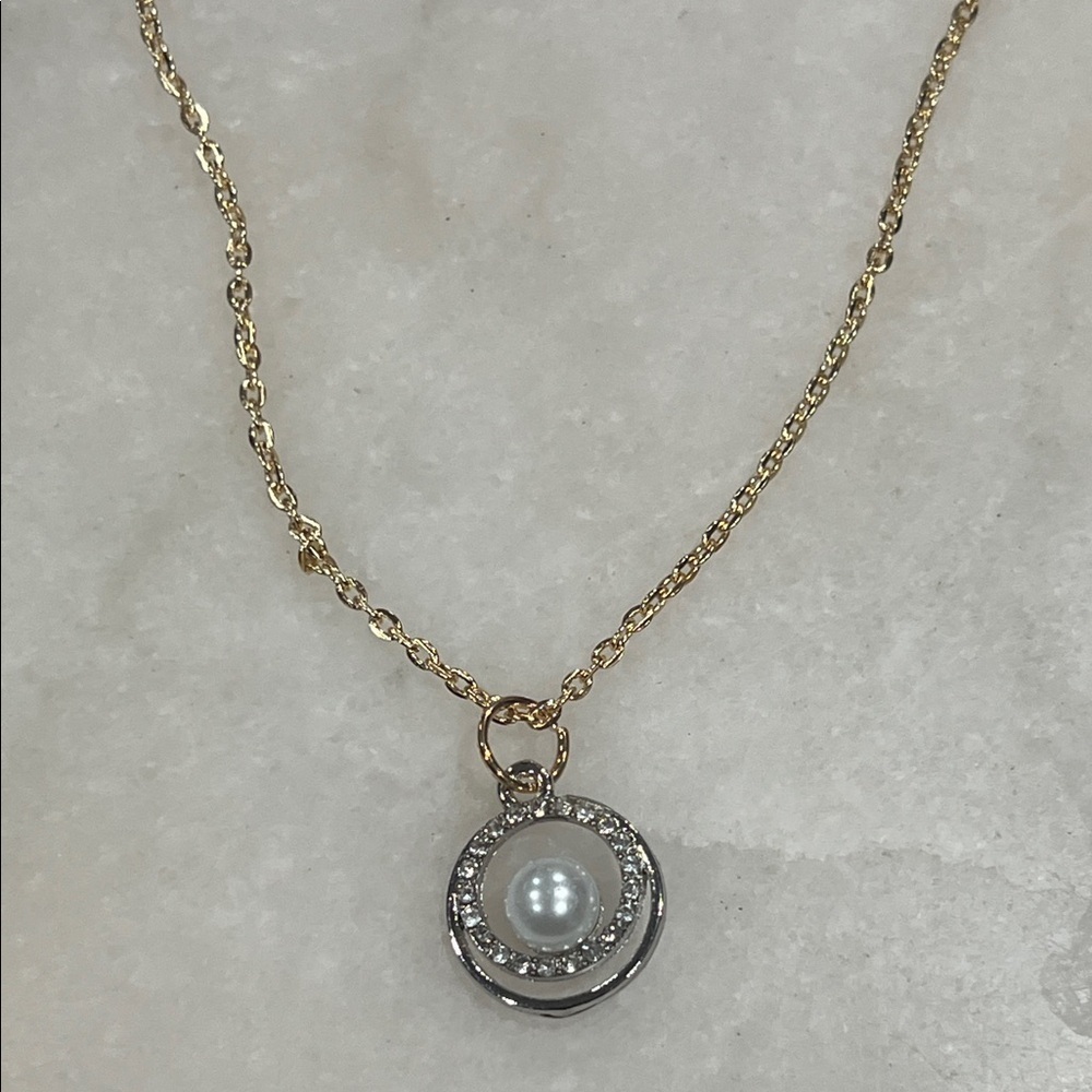 Elegant Gold and Silver Pendant Necklace